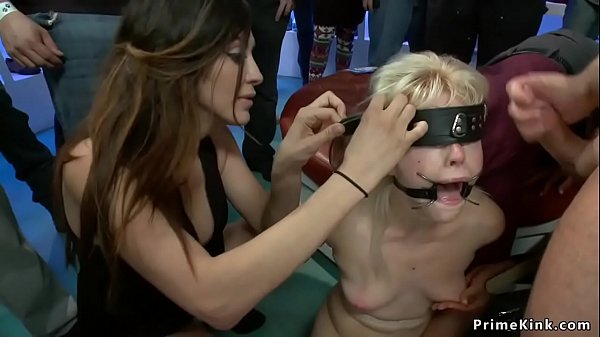 Gagged blonde is fucked in public_shop