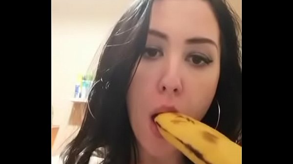 Slut at home practicing deep throat with banana