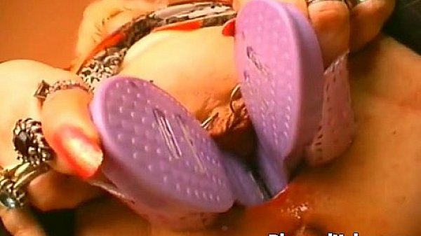 Lovely woman riding a huge bottle