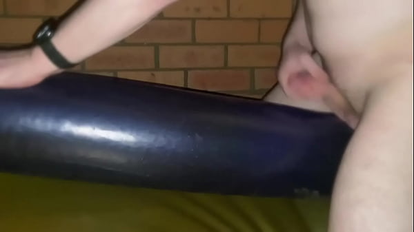 Masturbating On Top Of Waterbed Tube In Rubber Clothing thumbnail