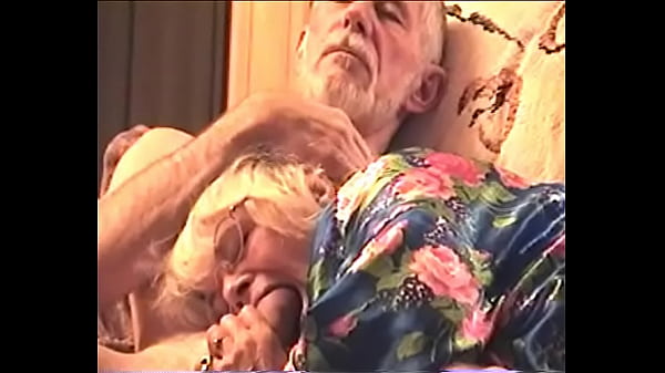 APRIL6 2006_SUCKING_COCK IN_HER BLUEFLOWERED ROBE AT THE COTTAGE