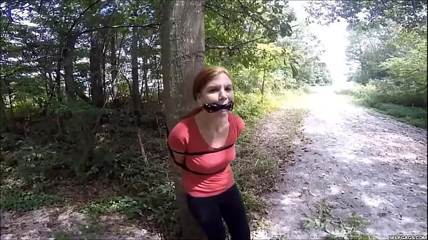Gagged Girl Bound In The Woods thumbnail