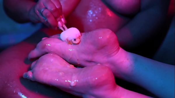 Cutie piie rubs popsicle on bia's feet 