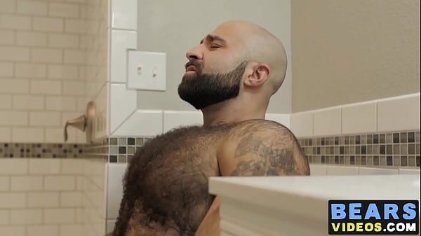 Bear washes his furry body and spanks his thick monkey