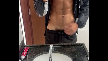Hot hairy fitness hunk flashing his body in commando shorts