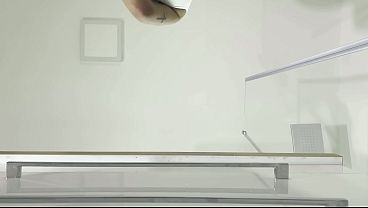 Over knee socks wearing hot and horny brunette slut in a flying short skirt show her ass