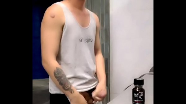 Horny young Asian guy shows off his cock in public toilet! 