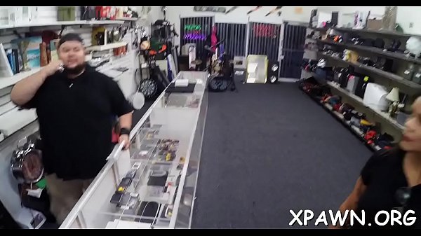 Amazing young womanis having sex in shop with dude