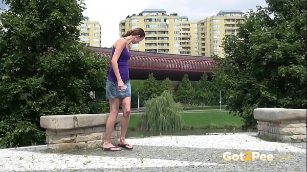 Got2pee Brings Another Desperately Peeing Girl In Sunny Park - Featuring Big Puddle thumbnail