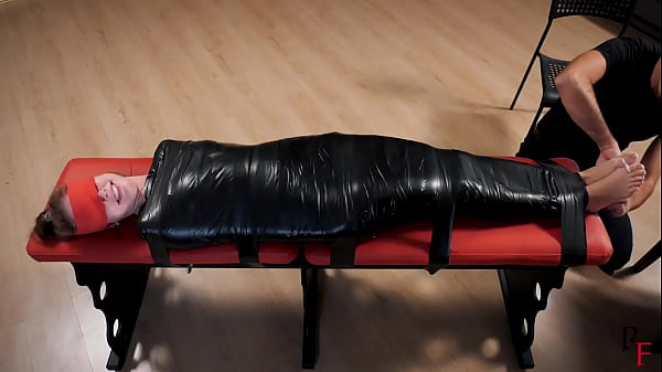 A difficult challenge for leya tight pvc mummification and intensive foot tickling