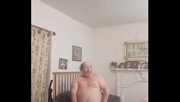 Pants down playing with vacuum cleaner