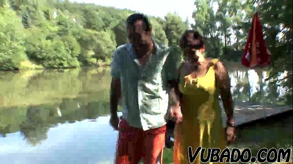 MATURE COUPLE HAVING OUTDOOR FUN