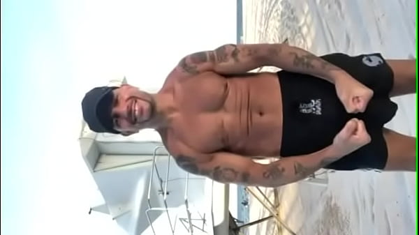 THE PORN_STAR CHAMPION MODELING SWIM TRUNKS AT THE BEACH