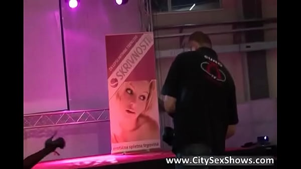 Sexy and busty ginger babe stripping