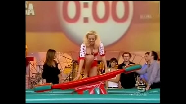 A blonde italian celeb is doing some indoor surfing for a tv show in a miniskirt it was always clear there was be the inevitable upskirt oops fun