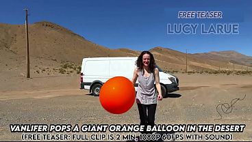 "Vanlifer Pops A Giant Orange Balloon in the Desert" 