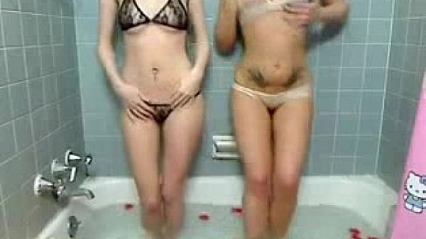 Two sexy babes stripping and teasing