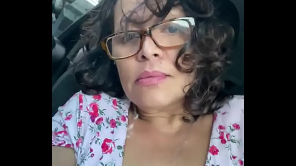 Latina milf teasing in the car