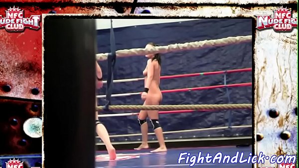 Dyke babes wrestle naked in a boxing_ring