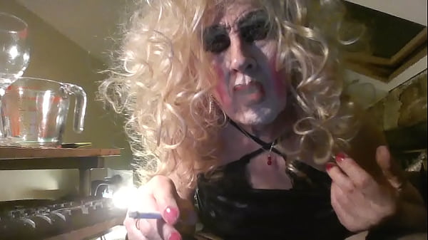 Smoking sissy is ordered to totally degrade herself, sticks dildo up her arse, drinks own piss, masturbates and cums, drinks cum 