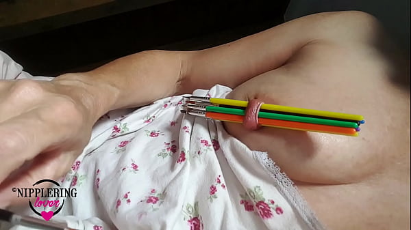 nippleringlover horny_inserting multiple sticks in extreme stretched_nipple piercing