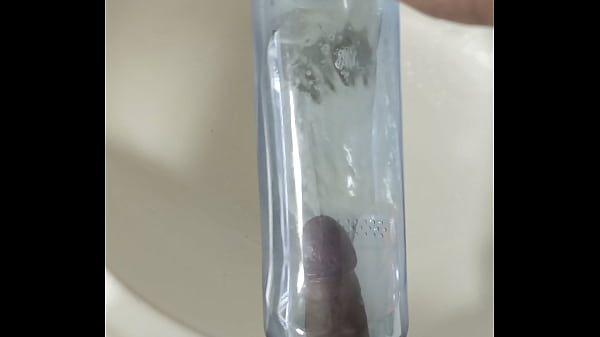Ilovemasturbate1984 peeing in a bottle