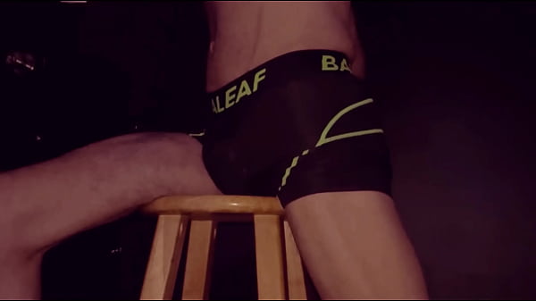 Play MP4 - Grinding Up Close On Stool in Bicycle Shorts with Dark Background