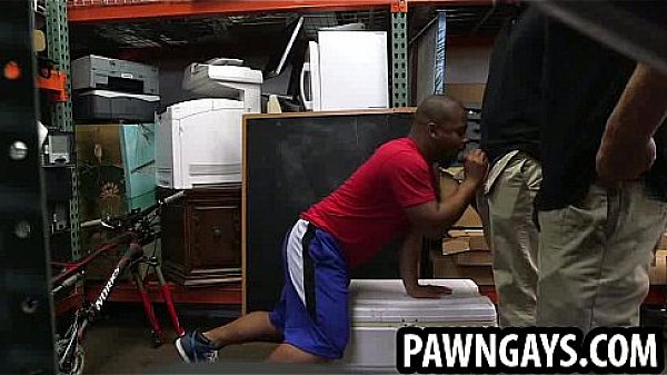 Ebony hunk sucking on two cocks at the pawn shop 