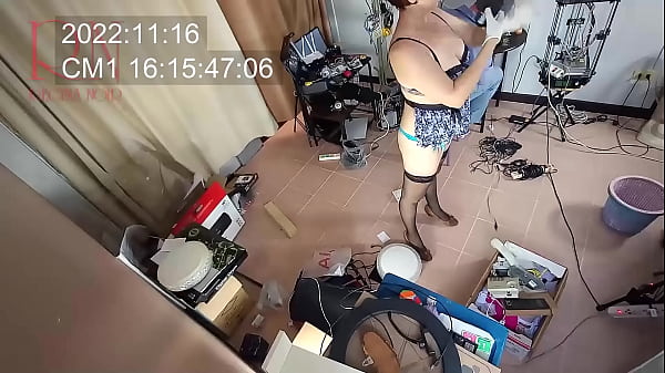 A stripped cleaner maid collects cables and computer parts in a box