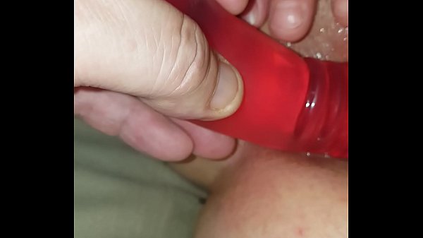 Wife takes jelly double dildo in both holes