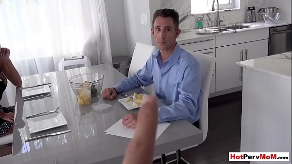 Busty MILF stepmotherblows her stepson next to stepdad