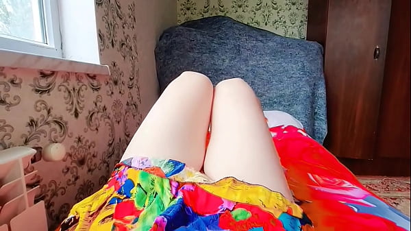 Cute femboy pulling oversized sweater over bare legs 