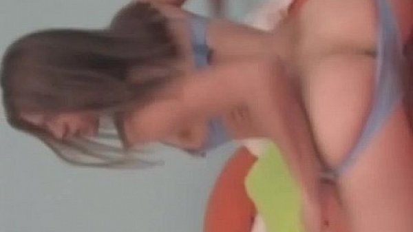 Hot brunette stripteasing