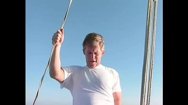 Play MP4 - An older man hard fucks a sexy brunette on a yacht and inserts an excited penis deep into his throat