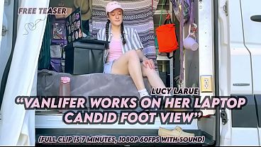"vanlifer works on her laptop candid foot view"