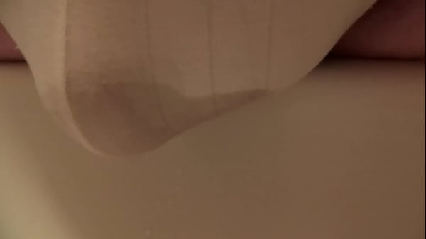 peeing in_white underpans_over sink