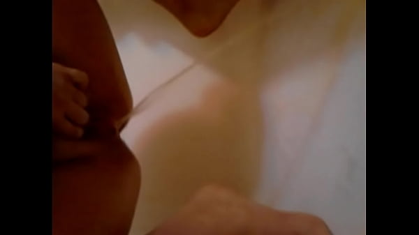 Girl takes long pee in shower