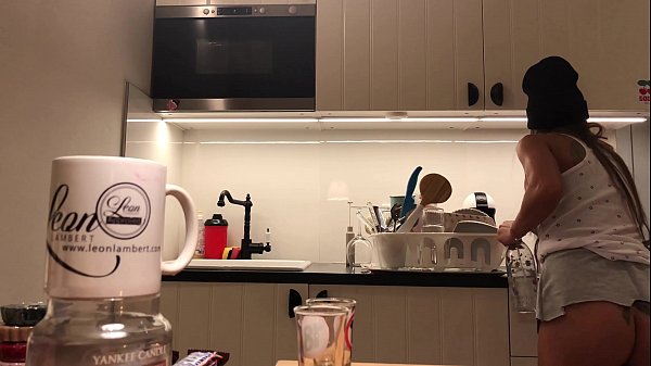 Braless girl in the kitchen no underwear 