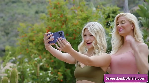 Watch this big tit blondie stepmom seducing her step-daughter for a quickie 