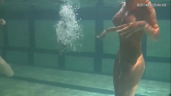 Russian babes Irina and Anna swim and hug in the pool 