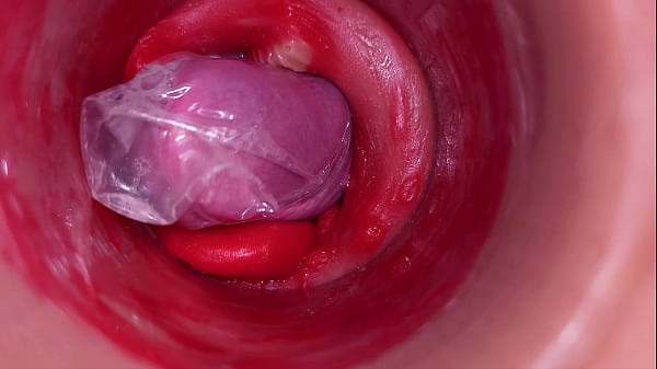 The_camera inside the deep pussy records a huge ejaculation_with a stuck condom