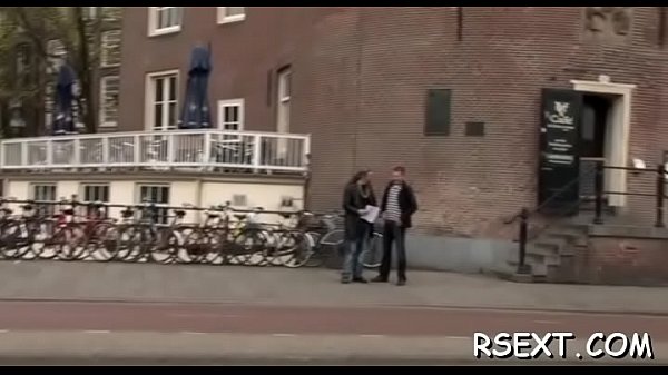 Hot hookerwith big fake boobs gives a steaming hot oral sex job