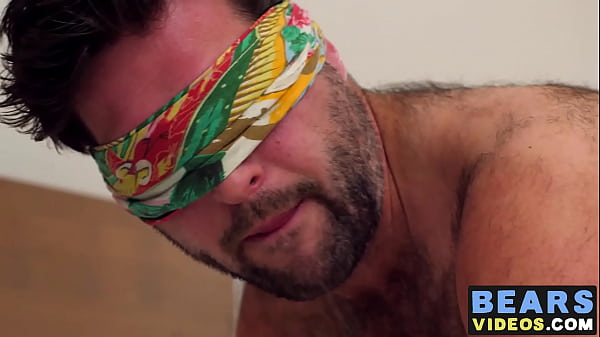 Blindfolded bear plays with his dick 