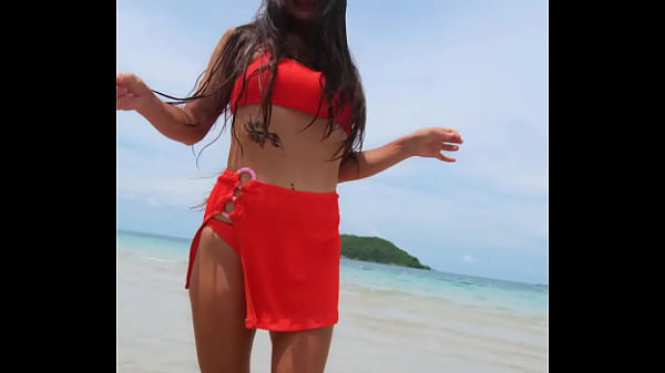 Orange sexy bikini fun on the tropical beach 