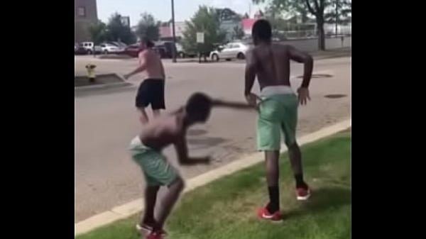 Two big boys slap each other