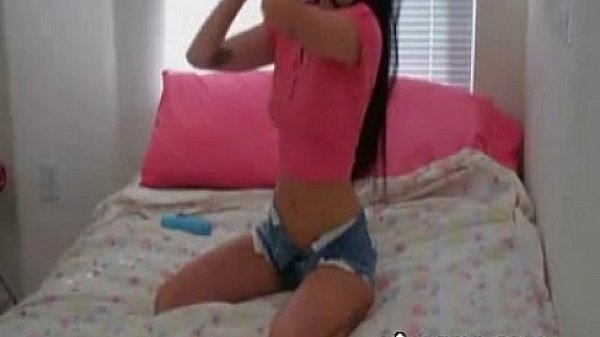 Hottie stuffing her pussy with dildo