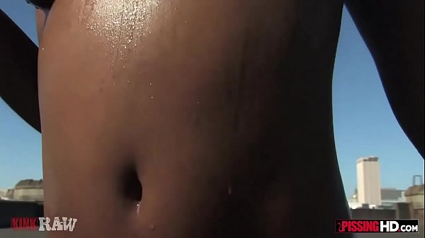 Skinny ebonyslut gets pissed on by two_men