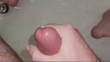 I sit on the side of the tub and cum some pee