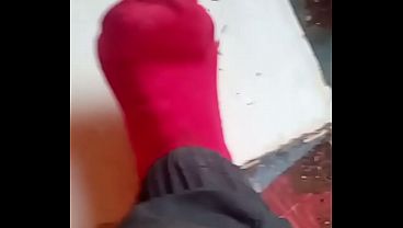 Young boy like his foot 