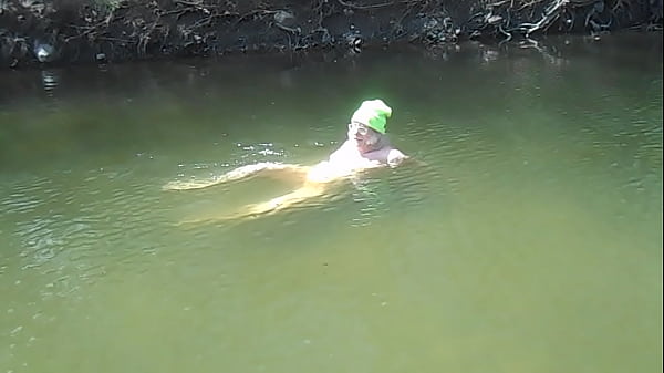 Play MP4 - Naked Driver stands up in the river and shakes off